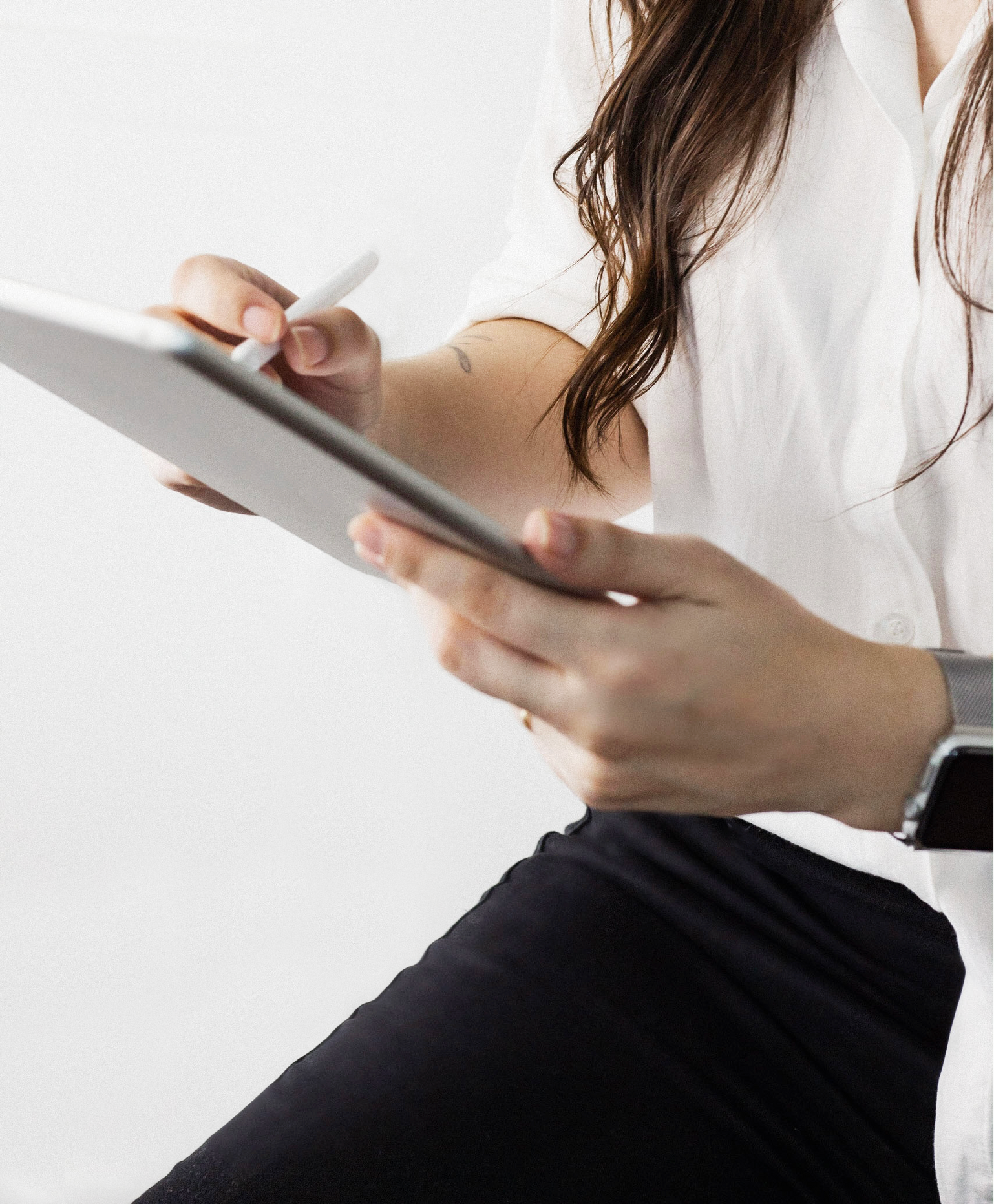 Woman working using ipad